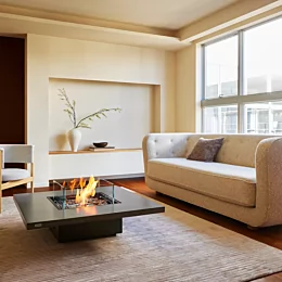 EcoSmart Fire Vertigo 40 Fire Table brings modern ethanol fireplace ambience to a private residence living room in Japan with a freestanding design.