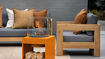 EcoSmart Fire Pop 8L Designer Fireplace adds clean-burning bioethanol warmth to Naked Flame NZ showroom, creating an elegant indoor focal point.