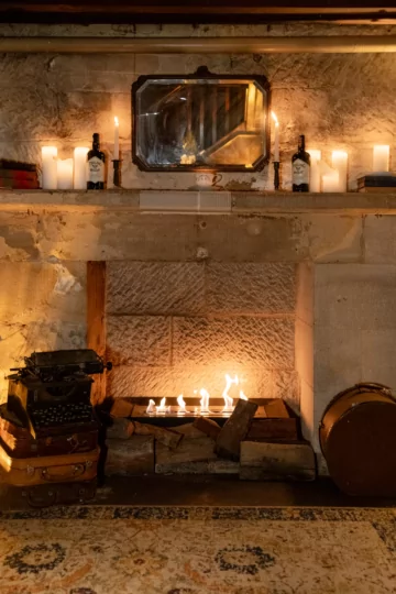 EcoSmart Fire Grate 36 fireplace grate brings a modern touch to a classic fireplace hearth.