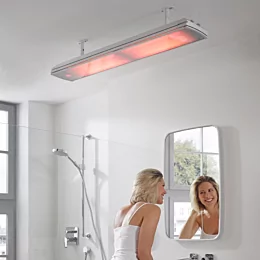 Heatscope Vision 3200W Radiant Heater elegantly wall-mounted in a contemporary indoor bathroom enhances comfort and energy efficiency for residential living.